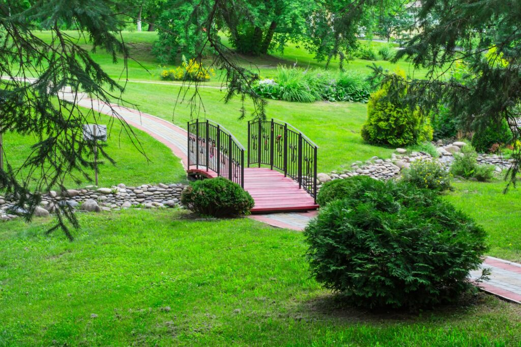 bridge over the brook in the park. Landscape design concept